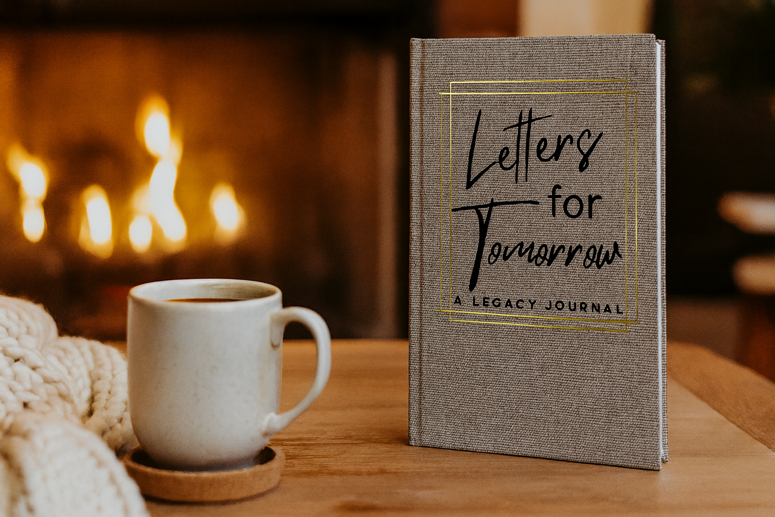 Letters for Tomorrow legacy journal beside a coffee cup by a warm fire, lifestyle setting